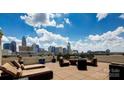 Spacious roof deck perfect for relaxing with city skyline views at 718 W Trade St # 302, Charlotte, NC 28202