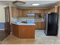 Spacious kitchen with tile floors, oak cabinets and modern appliances at 167 Patterson Rd, Kings Mountain, NC 28086