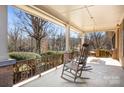 Inviting front porch with rocking chairs, perfect for relaxing and enjoying the outdoors at 3087 E Nc Hwy 150 Hwy, Lincolnton, NC 28092