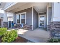 Inviting front porch featuring cozy seating, perfect for relaxing and enjoying the outdoors at 3624 County Down Ave # 5-14, Kannapolis, NC 28081
