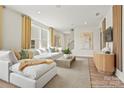 Cozy living area with a comfortable sectional, stylish decor, and lots of natural light at 1615 Shoals Ave # 158, Belmont, NC 28012