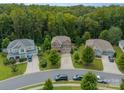 Aerial view of homes in a suburban neighborhood, showcasing lush green landscaping at 2108 Clarion Dr, Fort Mill, SC 29707