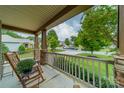 Inviting front porch with rocking chairs, offering a relaxing outdoor space at 2108 Clarion Dr, Fort Mill, SC 29707