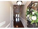 Inviting entryway with hardwood floors, fresh paint, and access to a spacious living area at 258 Lagoda Dr, Locust, NC 28097