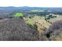 Scenic aerial view showcasing the property's sprawling landscape and surrounding natural beauty at 3427 Joe Johnson Rd, Catawba, NC 28609