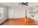 Spacious living room featuring hardwood floors and ample natural light at 3610 Melrose Cottage Dr, Matthews, NC 28105
