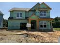 New home under construction featuring windows and a framed entryway, ready for customization at 4688 Glen Stripe Dr # Cal0069, Indian Trail, NC 28079