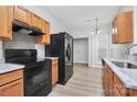 Well-lit kitchen featuring modern appliances, updated countertops, and ample storage space at 1765 Holliford Ct, Charlotte, NC 28215