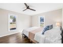 Bright bedroom with hardwood floors, two windows, and neutral paint at 2927 Forest Hills Cir, Rock Hill, SC 29732
