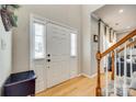 Welcoming entryway with hardwood floors, staircase, and natural light at 550 S Portman Ln, Fort Mill, SC 29708