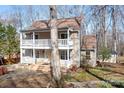 Charming two-story home featuring double balconies, a well-maintained yard, and inviting curb appeal at 11121 Timber Hill Ct, Charlotte, NC 28226