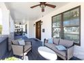 Inviting front porch featuring comfortable seating, perfect for relaxing and enjoying the outdoors at 2526 Fort St, Charlotte, NC 28205