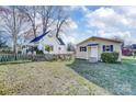 Spacious backyard with wooden fencing, offering both privacy and room for outdoor activities at 305 S Clay St, Gastonia, NC 28052