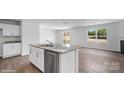 Modern kitchen with stainless steel appliances, a center island, and an open layout at 3708 13Th Ne St, Hickory, NC 28601