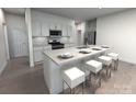Bright kitchen features a large center island with seating at 5208 Georgette Trl, Cherryville, NC 28021