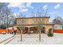 Home featuring a spacious backyard patio with outdoor seating and an inviting covered porch at 8104 Stem Ct, Charlotte, NC 28227