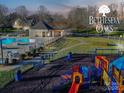 Bethesda Oaks community pool and playground with colorful play structure at 3427 Laurel Oak Ln, Gastonia, NC 28056