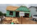 Image showing a home under construction, with visible framework and building materials, indicating the building phase at 2210 Camber Dr # Cwo0075, Gastonia, NC 28054