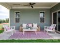 Cozy outdoor patio featuring a comfortable seating area, perfect for relaxing and entertaining guests at 2210 Camber Dr # Cwo0075, Gastonia, NC 28054