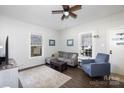 Comfortable living room with natural light and a cozy seating arrangement, ideal for Gathering gatherings at 206 Mcconnell St, Clover, SC 29710