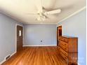 Inviting living room with hardwood floors, neutral walls, and ample natural light, ideal for relaxation at 4069 Amsbury Rd, Concord, NC 28025