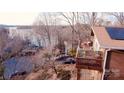 Aerial view of the home showcasing a large upper deck overlooking the lake at 9009 Cebu Ct, Fort Mill, SC 29708