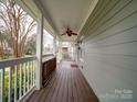 Cozy front porch featuring a ceiling fan and views of the neighborhood at 2729 Duncan Ave, Charlotte, NC 28205