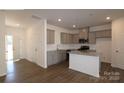 Modern kitchen features granite counters, stainless steel appliances, and center island at 3509 Nimbell Rd, Monroe, NC 28110