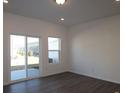 Bright living room featuring a sliding glass door providing backyard views at 3509 Nimbell Rd, Monroe, NC 28110