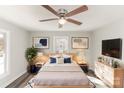 Serene bedroom with a ceiling fan, soft lighting, and tasteful decor for a relaxing atmosphere at 1003 Harris St, Kannapolis, NC 28081