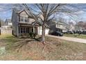 Two-story home featuring a front porch and two-car garage, nestled in a Gathering-friendly neighborhood at 757 Jones Branch Rd, Fort Mill, SC 29715