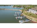 Lake view from the water, with a marina for boating and water activities at 150 Harbor Cove Ln, Mooresville, NC 28117