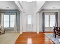 Inviting foyer featuring high ceilings, hardwood floors, elegant columns and a bright entryway at 3563 Valiant Sw Ave, Concord, NC 28027