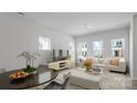 Bright living room with a sleek media center, modern furniture, and a view of the neighborhood at 4710 Lakeview Rd, Charlotte, NC 28216