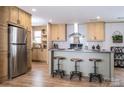 Well-equipped kitchen with stainless steel appliances, a center island with bar seating, and ample cabinet space at 00 Old York Rd, Chester, SC 29706