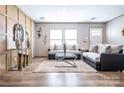 Bright living room featuring contemporary furnishings, wood-look flooring, and stylish decor creating a welcoming ambiance at 00 Old York Rd, Chester, SC 29706