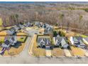 Enjoy serene neighborhood views in this wooded neighborhood with perfectly spaced homes and cul-de-sac street at 1066 Streamlet Way, Monroe, NC 28110
