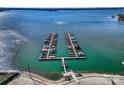 Aerial view of a marina with boat docks on Lake Norman, NC, revealing beautiful views of the lake at 127 Lakewood Circle Dr, Mooresville, NC 28117