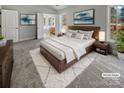 Serene bedroom with large bed, accent lighting, neutral tones, and a view to the en-suite bathroom at 3450 Seminole Dr, Maiden, NC 28650