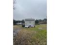 Cozy single-story home showcasing its neat exterior and surrounding yard at 412 Sumter St # A, Clover, SC 29710