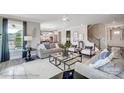Inviting living room with hardwood floors, neutral palette, an open layout, and plenty of natural light at 8712 Acadia Pkwy # 595, Sherrills Ford, NC 28673