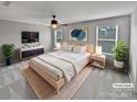 Cozy main bedroom with a ceiling fan, soft carpet, and a serene atmosphere at 113 Clove Hitch Dr, Statesville, NC 28677