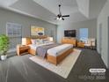Tranquil main bedroom with tray ceilings, a ceiling fan, and a cozy seating area at 235 Glenville Dr, Fort Mill, SC 29715
