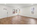 Bright living room featuring hardwood flooring and lots of natural light at 38 Magnolia St, York, SC 29745