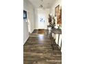Entryway view featuring hard wood floors, neutral walls, and decorative accents at 2617 Manor Stone Way, Indian Trail, NC 28079