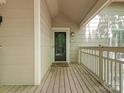 Inviting front porch with decorative welcome mat and ample space for outdoor seating and relaxation at 5011 Sharon Rd # J, Charlotte, NC 28210
