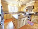 Spacious kitchen with granite countertops, stainless steel appliances, and a central island at 720 9Th Nw Ave, Hickory, NC 28601