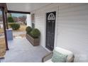 Cozy front porch with seating, stylish decor, and a well-maintained exterior at 720 Holmes St, Salisbury, NC 28144