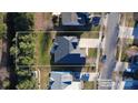 Aerial view of the property showcasing the house, yard, driveway, and surrounding neighborhood at 1121 Mckee Farm Ln, Belmont, NC 28012