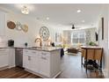 Bright, open-concept space with a kitchen island flowing into a comfortable living area at 2802 15Th Avenue Se Pl, Hickory, NC 28602